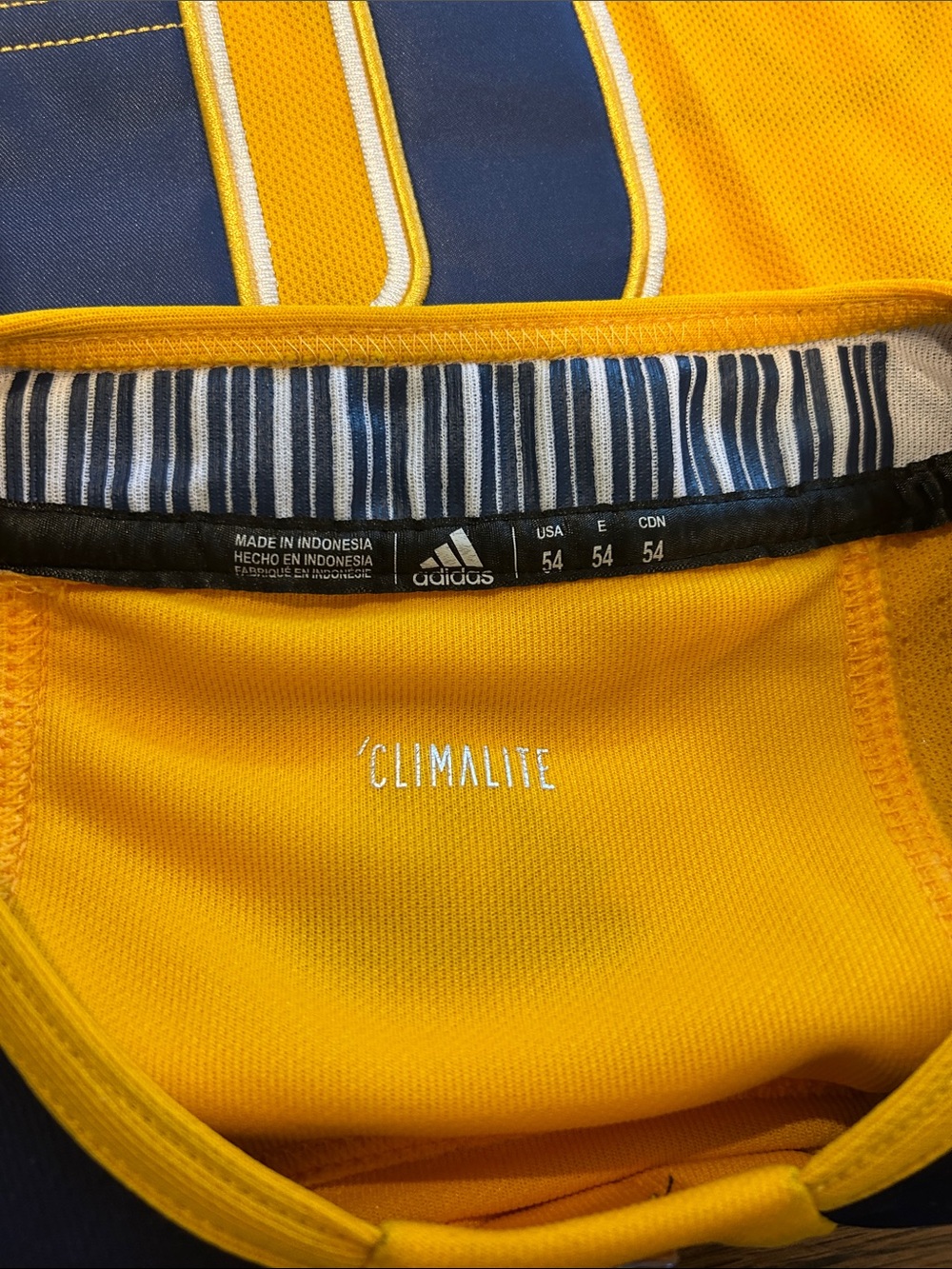NHL Nashville Predators Gold and Navy Alternate Jersey with 'A' - Picture 7 of 7